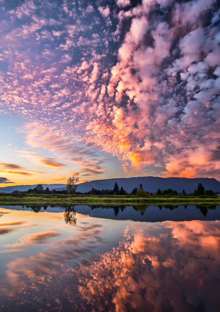 Symmetrical Photography of Clouds Covered Blue Sky